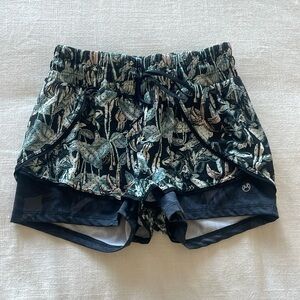 Size small Maaji workout shorts with built in tight shorts underneath.